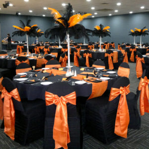 Black pleated designer chair cover with orange satin sash (2)