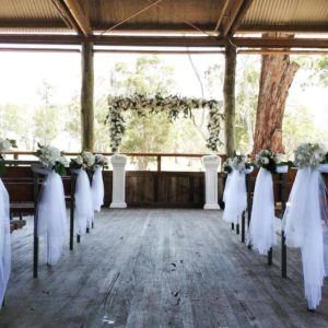 White arch with native florals
